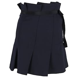 Falda mini plisada con lazo Sandro Paris en poliéster azul marino