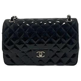 Bolso Chanel Timeless Jumbo Double Flap en piel de charol negra