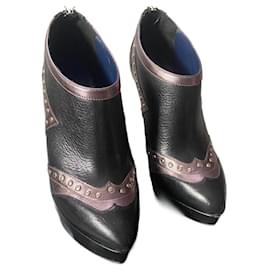 Tronchetti con plateau Studio Pollini in pelle nero bronzo