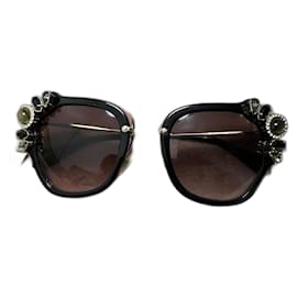 Lunettes de soleil Miu Miu noires avec broderie de pierres