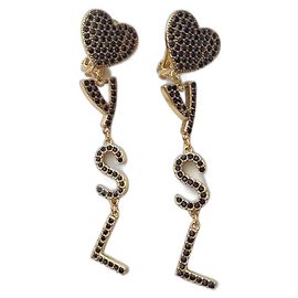 Ottime condizioni - Orecchini monogramma Saint Laurent neri e dorati