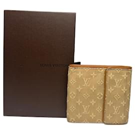 Cartera de lona monograma Louis Vuitton vintage amarilla blanca