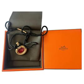 Hermès Colgante de Frasco de Perfume Dorado
