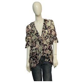 Blusa Blumarine de seda con estampado floral y volantes