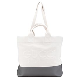 Tote de lona blanca con logo en relieve de Gucci