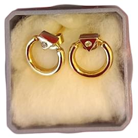 Ohrringe aus Gold, verziert mit einem kleinen Diamanten - Autre Marque