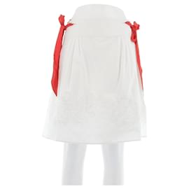 Falda blanca con lazos - Autre Marque