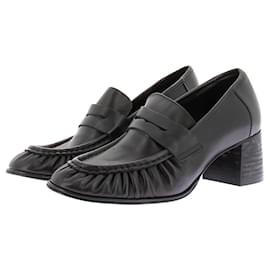 Mocassini con tacco in pelle nera Mango 39