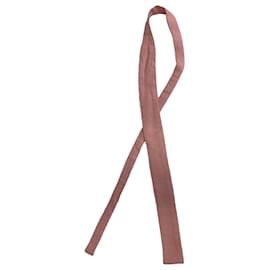 Cravatta testurizzata in seta rosa di Acne Studios