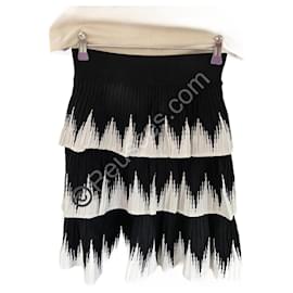 Short black and white Maje skirt in very good condition