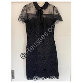 Vestido negro de encaje Sandro en muy buen estado