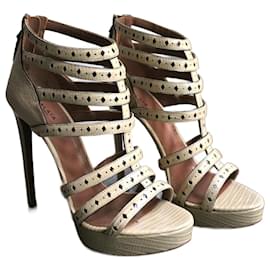Alaïa Pumps aus Leder beige und schwarz