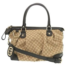 Borsa a mano in tela GG Gucci in pelle