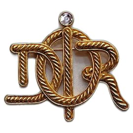 Spilla monogramma Dior dorata