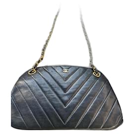 CHANEL – Borsa vintage in agnello nero a zigzag