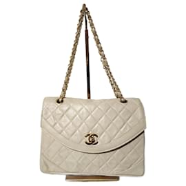 Borsa a spalla Chanel Classica Timeless Matelassè crema