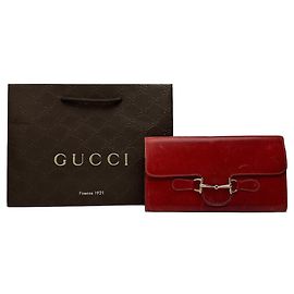 Portafoglio in pelle vintage Gucci con morsetto rosso
