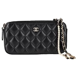 Portafoglio a catena con doppia zip Chanel in pelle trapuntata nera