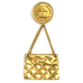 Spilla in metallo dorato Chanel
