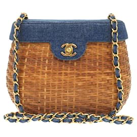 Bolso de hombro de paja y cuero azul marino Chanel