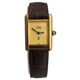 Cartier Tank Uhr vergoldet silber senfgelb