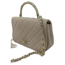 Borsa a mano Chanel Coco Handle in pelle beige