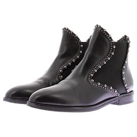 Stivaletti Alaïa in pelle nera con borchie