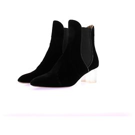 Botines Alaïa de terciopelo negro con tacón transparente