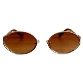 Lunettes de soleil Miu Miu OMU en métal doré