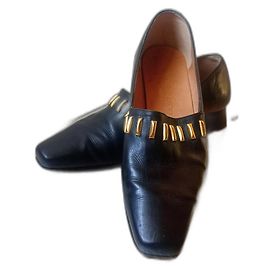 Mocassini JB Martin in pelle nera con borchie dorate