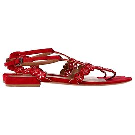 Sandali flat con cinturino alla caviglia in suede rosso con taglio laser Alaïa Flower