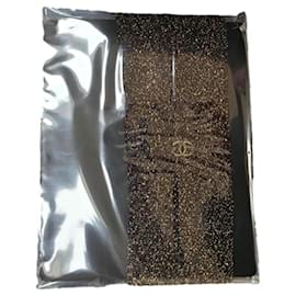Collant Chanel in nylon nero e oro
