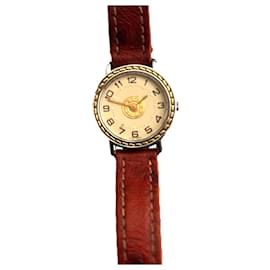 Montre Hermès Sellier Or et Acier 24mm