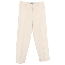Calças retas Miu Miu em algodão creme