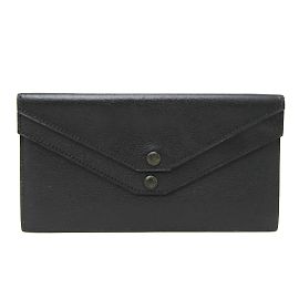 Hermès Billetera Hermes Flap en cuero de cabra negro