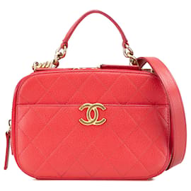 Bolso de cámara pequeño acolchado en caviar rojo de Chanel con asa superior