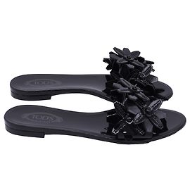 Sandali piatti a scivolo in pelle verniciata nera con applicazione floreale di Tod's