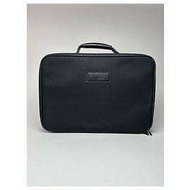 Maleta de lona y cuero Issey Miyake vintage negra