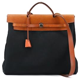 HERMÈS - Hermès Herbag 38 Schultertasche aus vintage schwarzem Canvas
