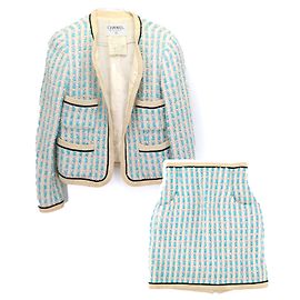 CHANEL - Conjunto de chaqueta y falda Chanel en tweed azul y marfil (36)
