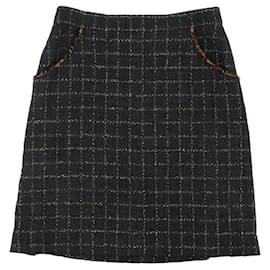 CHANEL - Falda de tweed negra Chanel (tamaño 46)