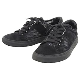 Chanel Logo Mesh Sneakers aus Leder und Wildleder in Schwarz