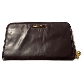 Cartera Miu Miu de piel de pelo rojo oscuro morado oscuro