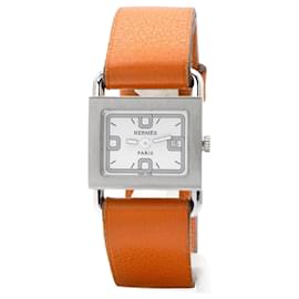 Montre Hermès Barenia BA1.210 cadran argent bracelet cuir orange