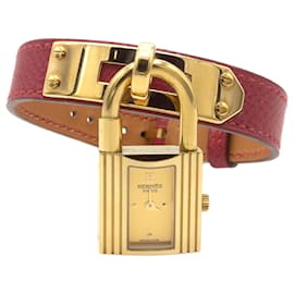 Hermès Kelly watch gold plated with red leather bracelet