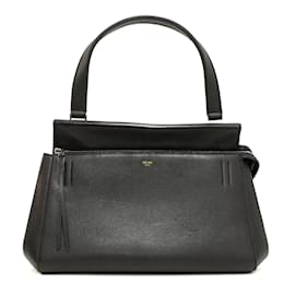 Celine Edge Handtasche aus schwarzem Leder, mit einem einzigen schwarzen Ledergriff für einfaches Tragen. - Céline