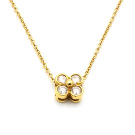 Collar Tiffany & Co en oro amarillo 18K con colgante de trébol y diamantes