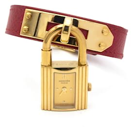 Hermès Kelly watch gold plated with red leather bracelet