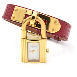 Hermès Kelly watch gold plated steel with red lizard leather strap