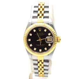 Rolex Oyster Perpetual Datejust watch in gold and steel.